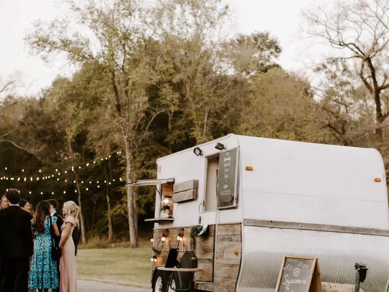 The Sycamore Coffee Camper parked and serving at an event